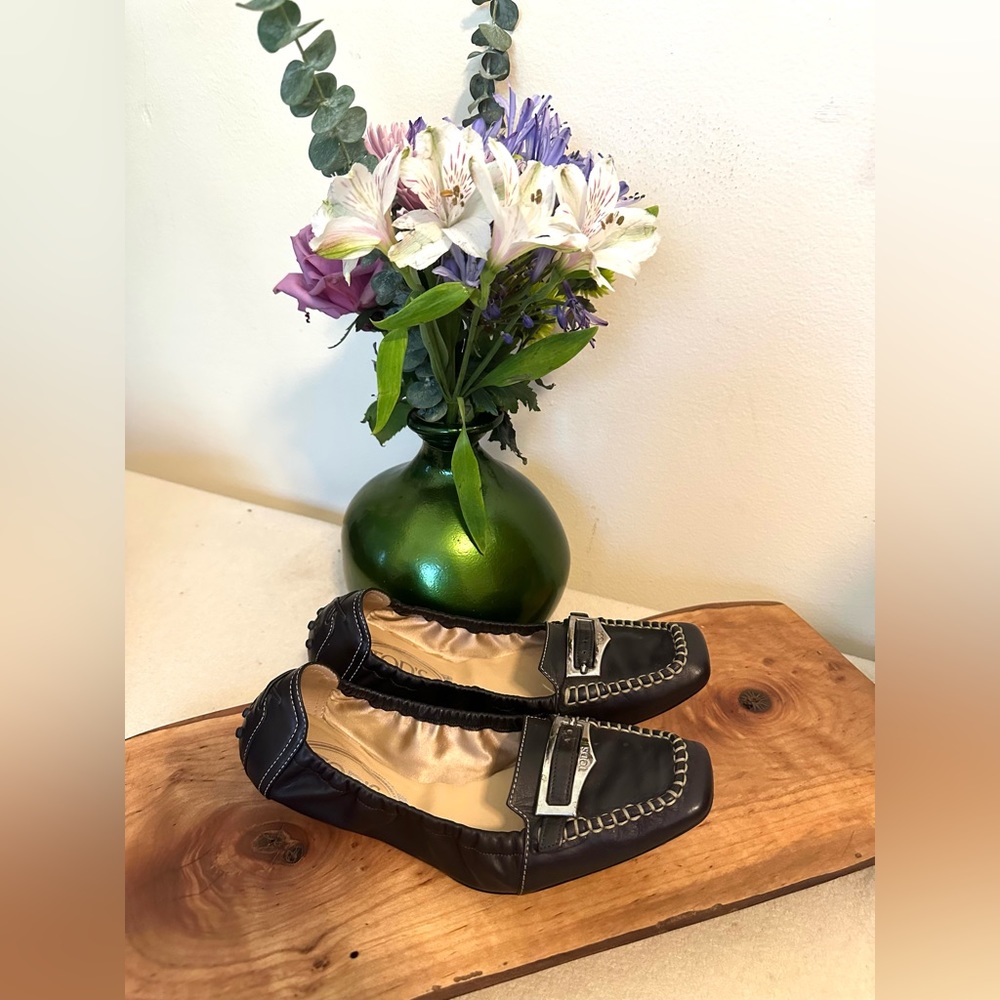 Tod's Black Leather Moccasin Flats with Silver Buckle